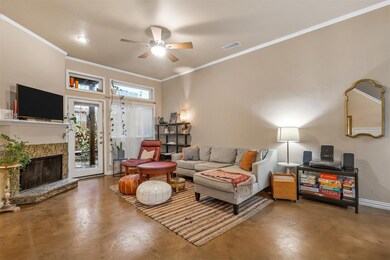 Spacious living area with door leading to backyard