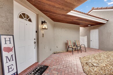Sweet Covered Porch Leads to your Private garage.