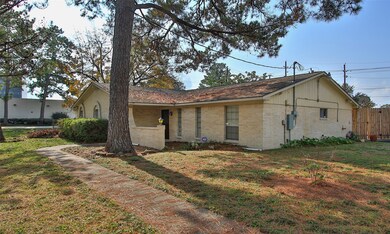 Side view with sidewalk.