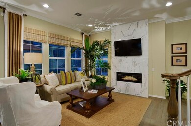 Marble fireplace, crown molding, wood flooring, sp