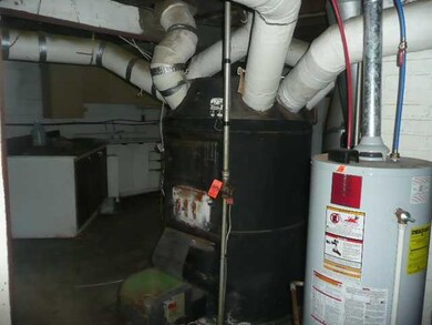 Basement. Interior pictures taken prior to house b