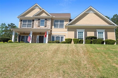 View of front of home featuring a front yard and s