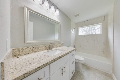 Relax and unwind in the spacious primary bath, fea