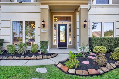 The stately front entry greets your family and gue