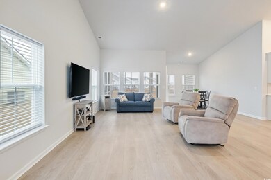 Living room featuring light hardwood / wood-style 