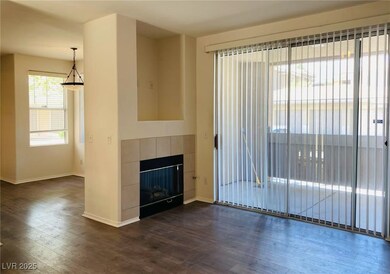 Unfurnished living room with dark wood-style floor