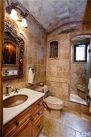 All bathrooms have custom travertine/tile through 