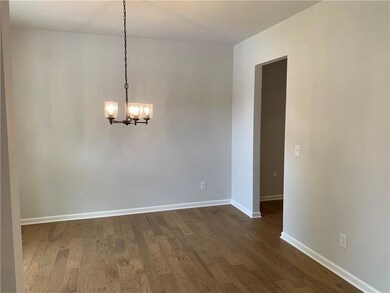 Dining with butler's pantry/walk-in pantry area en
