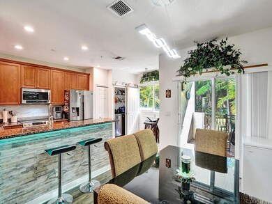 Two eat-in areas in and off of the kitchen