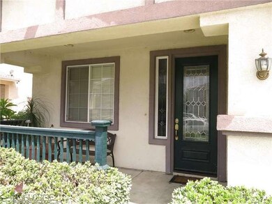Peaceful porch area for relaxing in this culdesac