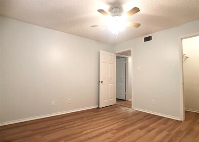 Unfurnished bedroom featuring a closet, a texture