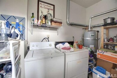 Each flat includes a closed-in rear porch with in-