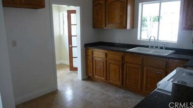 Front kitchen heading to laundry room.
