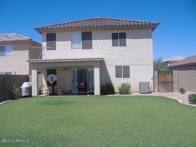 Back of home with Cov patio