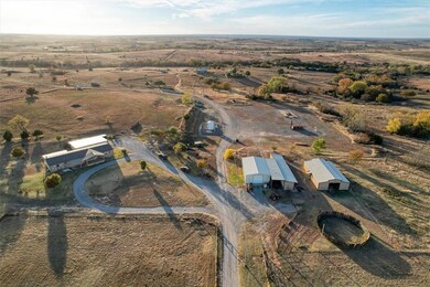 Aerial view of property's location with rural landscape