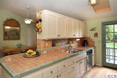 Custom ceramic tile accents in kitchen