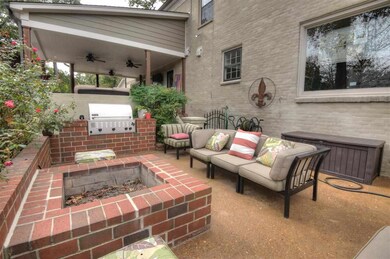Built in fire pit and gas grill make outdoor livin