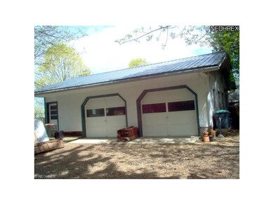 Two car garage with electric service.  shop & stor