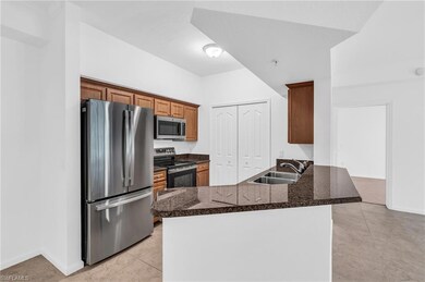 Kitchen with appliances with stainless steel finis