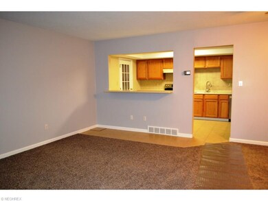 open floor plan with newer carpet throughout