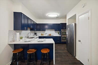 Large kitchen newly renovated, quartz countertops.