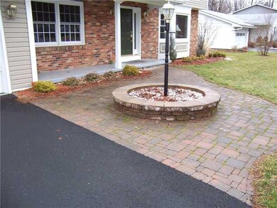 Exterior Front. New driveway with paver walkway.