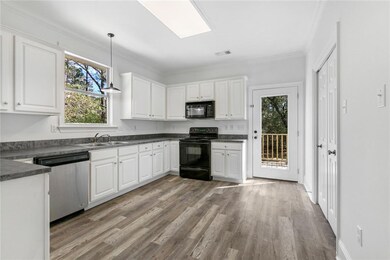 KITCHEN HAS LOTS OF COUNTERSPACE & ROOM FOR A CENT