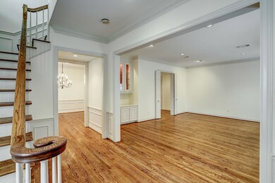 Anchored by gleaming hardwood floors, architectura