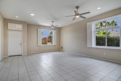 LIVING/DINING LOOKING TOWARD FRONT DOOR