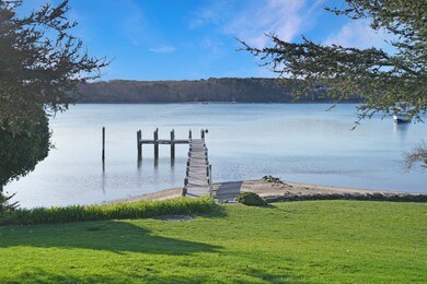 The L shaped dock and deep water mooring allows for multiple boats.