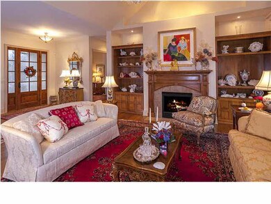 Living Room w/full wall of bowed-windows