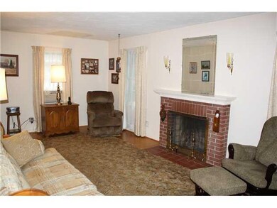 Living Room. Spacious living room with hardwood fl