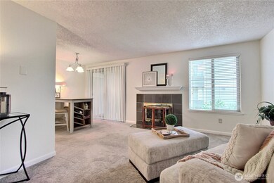The open floor plan is perfect for kicking back with a good book or hosting an intimate gathering with friends! This freshly painted ground floor unit shines with new hardware and stylish touches that make it feel just right. Cozy, inviting, and move-in ready — it’s everything you’ve been looking for in Federal Way!