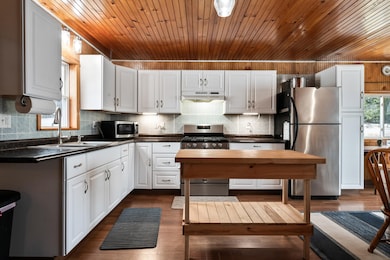 1420 E Side River Rd, Dummer, NH 03588 - photo 2