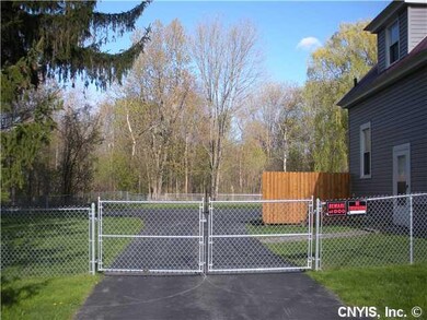 Other. Large paved driveway that widens at rear of