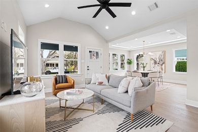 Tall ceilings and an open-concept layout create a