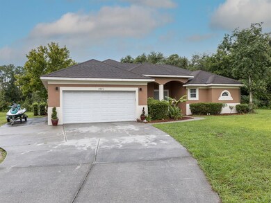 Front of house with side driveway for boat/rv park
