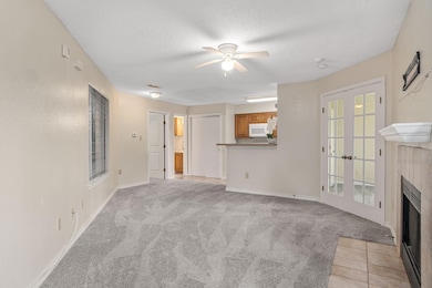 Unfurnished living room with a fireplace with flus