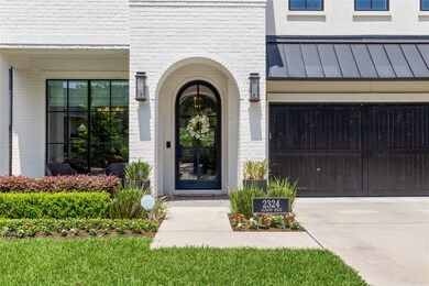 Gas Lanterns & Ebony Stained wood panel garage doo