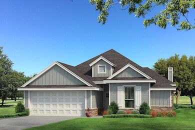 View of front of property with board and batten siding, a garage, a front lawn, driveway, and brick siding