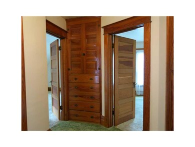 Bathroom. Built Ins  Hallway Leading into Two Bedr