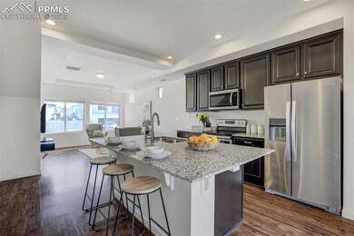Large kitchen island with ample seating.