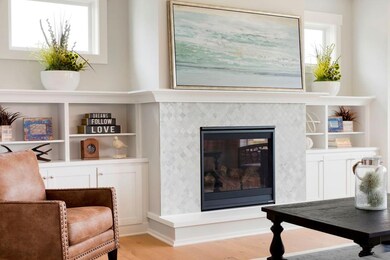 Customized built-ins flanking the lovely tiled fir