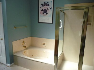Whirlpool, separate shower and double vanity with 
