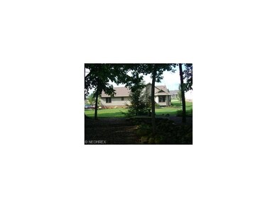 The view of the home from the back yard.