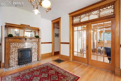 classic, large foyer with original fireplace