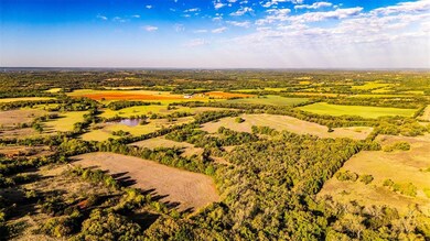 Drone / aerial view with a rural view and a water view