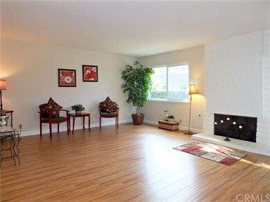 Large formal front living room with a nice brick f