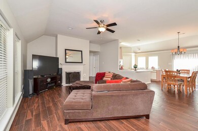 Gather around the beautiful mantel fireplace in the living room.
