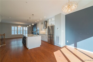 Kitchen featuring stainless steel appliances, whit